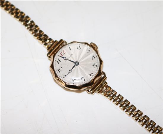 9ct gold-cased wristwatch on gold bracelet